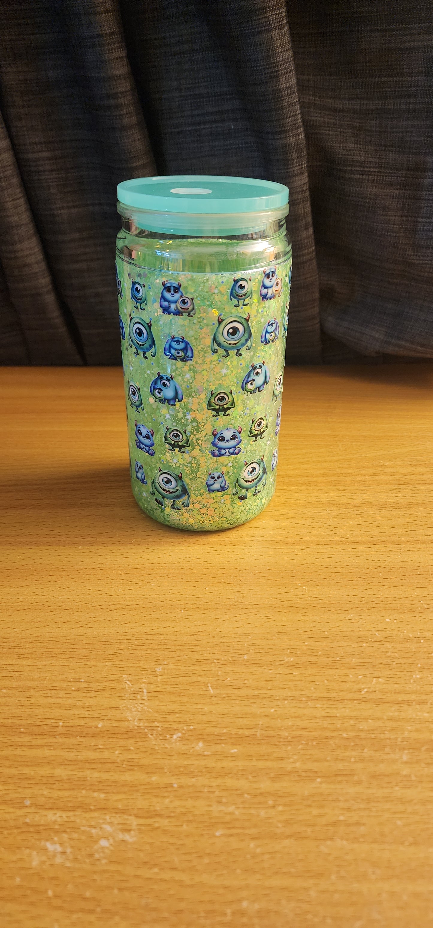 Glow in the dark mike snowglobe tumbler