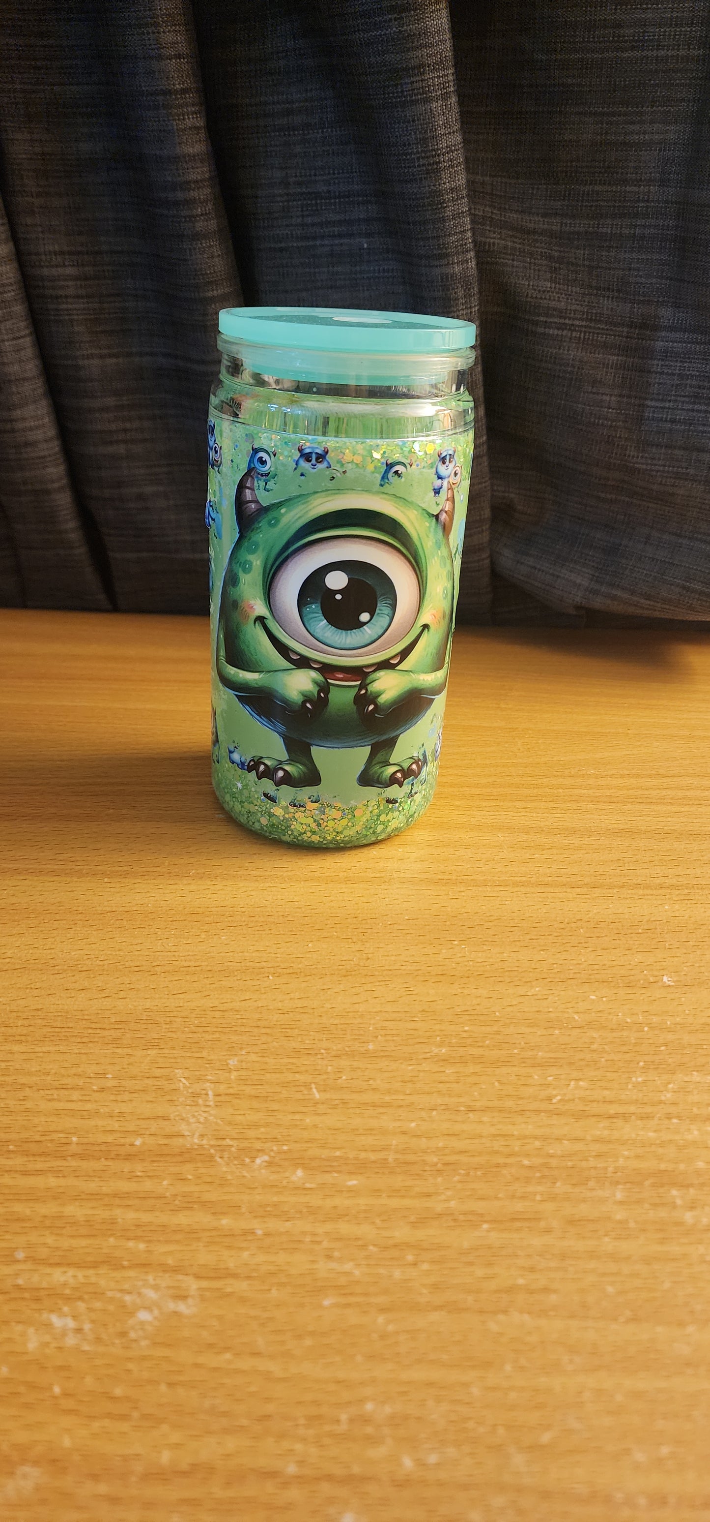 Glow in the dark mike snowglobe tumbler